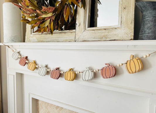 Fall pumpkin garland decoration for autumn mantle