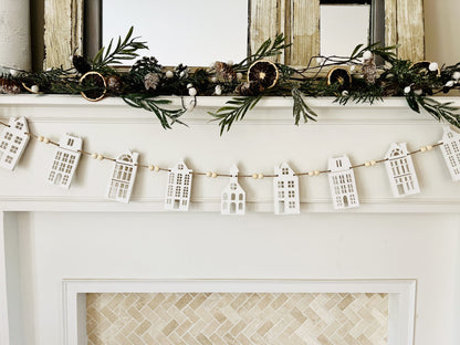 White house Christmas Village garland mantle decoration